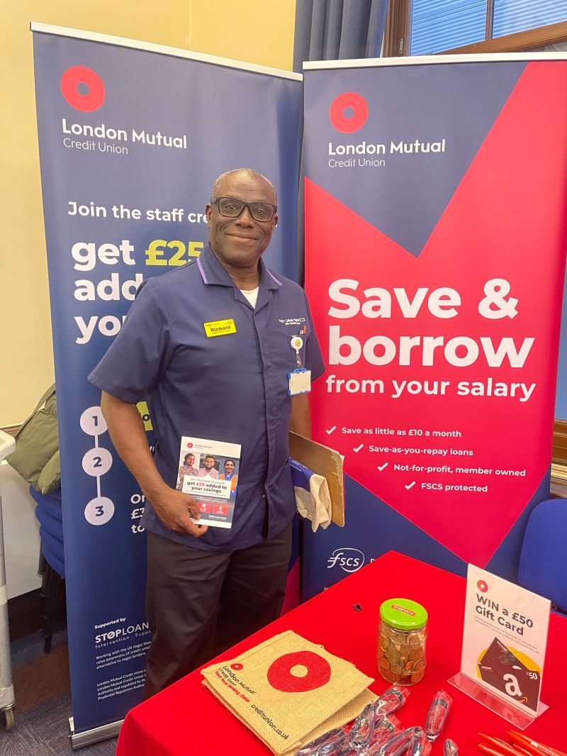 Staff member at King's College Hospital NHS Trust visiting London Mutual Credit Union's stand on a recent visit